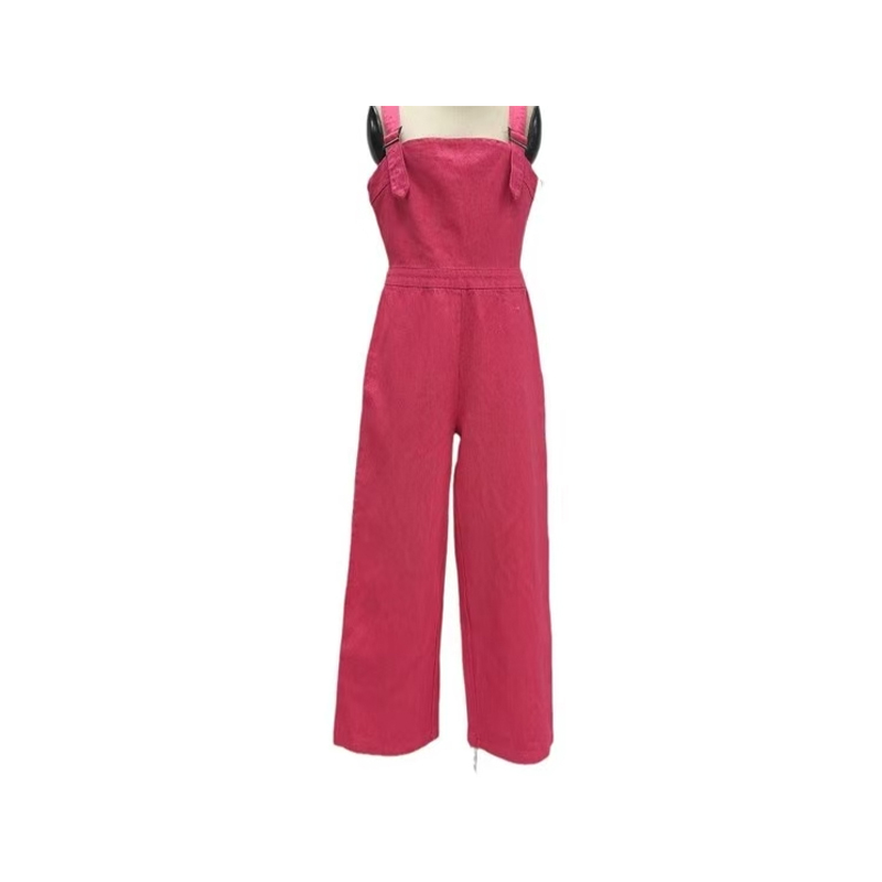 How does the retro wide-leg design of the retro wide-leg denim jumpsuit achieve a visually slimming effect?